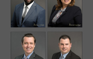an example of a set of four company headshots, a man and a woman top left and right, and two men bottom left and right. All are wearing business attire.