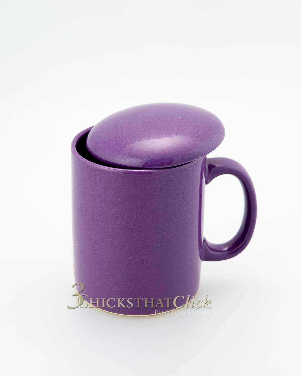 photo of purple teacup with lid