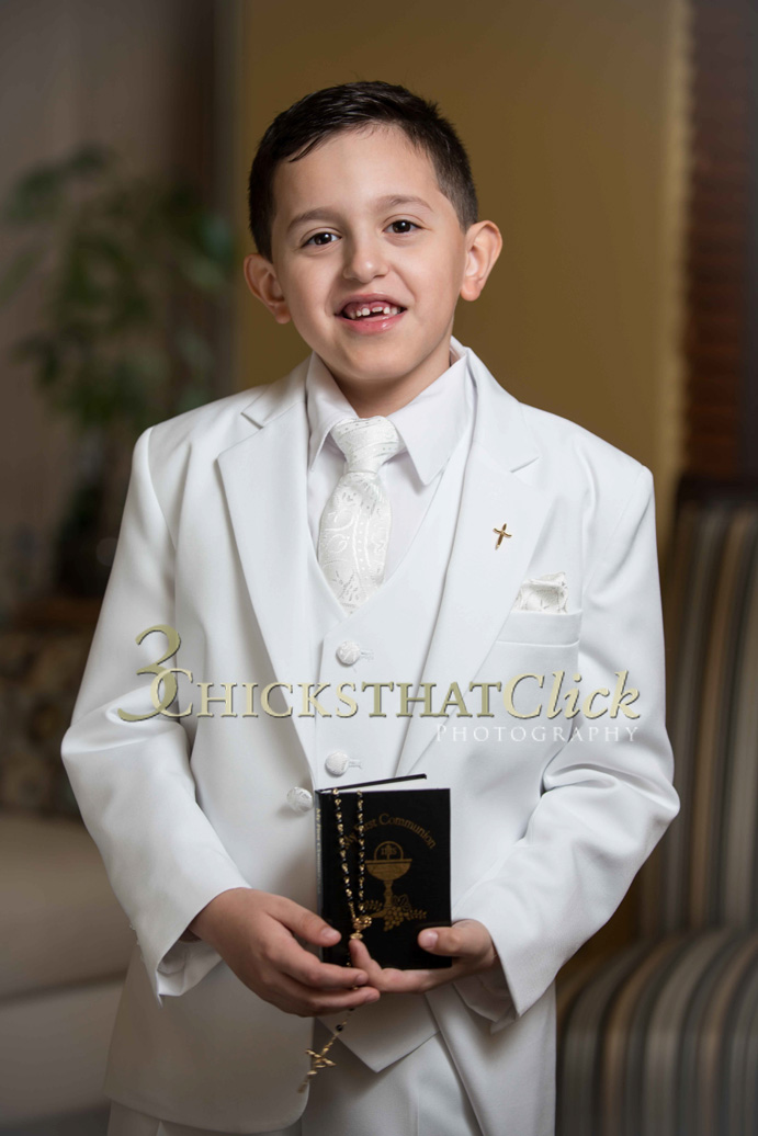 Boy in white 1st Communion suit
